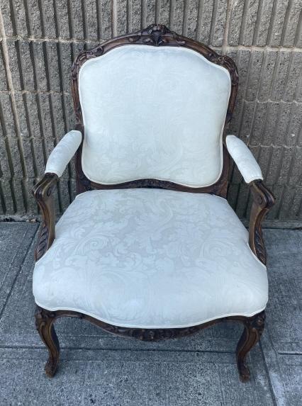 Louis XV Damask Upholstered Carved Armchair: Louis XV Style Damask Upholstered Carved Armchair. Measures 38 inches x 27 inches x 21 inches x 15 inches from floor to seat.
