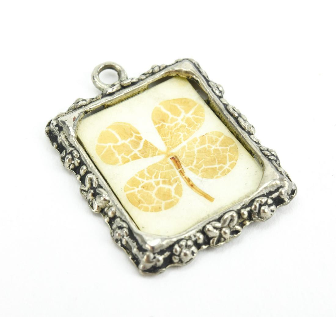 Sterling Silver Four Leaf Clover Necklace Pendant: Sterling Silver Four Leaf Clover Necklace Pendant. Measures just over 1 inch in length.