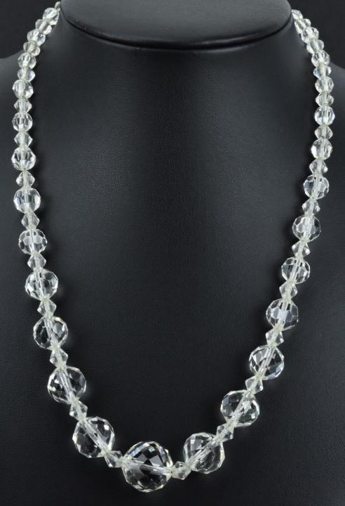 Antique Art Deco Faceted Rock Crystal Necklace: Antique Art Deco Faceted Rock Crystal Bead Necklace. Graduated size beads. Measures 16.5 inches in length. The graduated size beads are hand cut faceted rock crystal, the spacers are glass crystal.