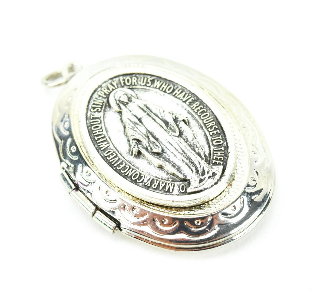 Vintage Virgin Mary Locket Necklace Pendant: Vintage Virgin Mary Locket Necklace Pendant. Measures 1.5 inches in length.