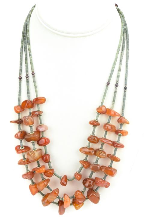 Vintage Three Strand Agate Carnelian Bead Necklace: Vintage Three Strand Agate Carnelian Bead Necklace. Measures 24 inches in length.