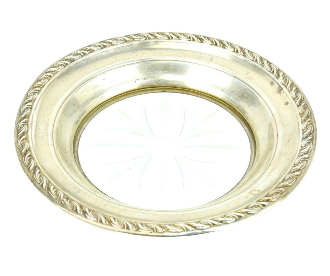 Sterling Silver & Etched Glass Wine Bottle Coaster: Sterling Silver & Etched Glass Wine Bottle Coaster Hallmarked. Measures 6.75 inches in diameter.