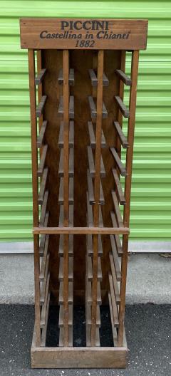 Rustic Hand Made Piccini Wine Rack: Rustic Hand Made Piccini Wine Rack. 3 column wine rack. Measures 52 inches x 15 inches x 15 inches.