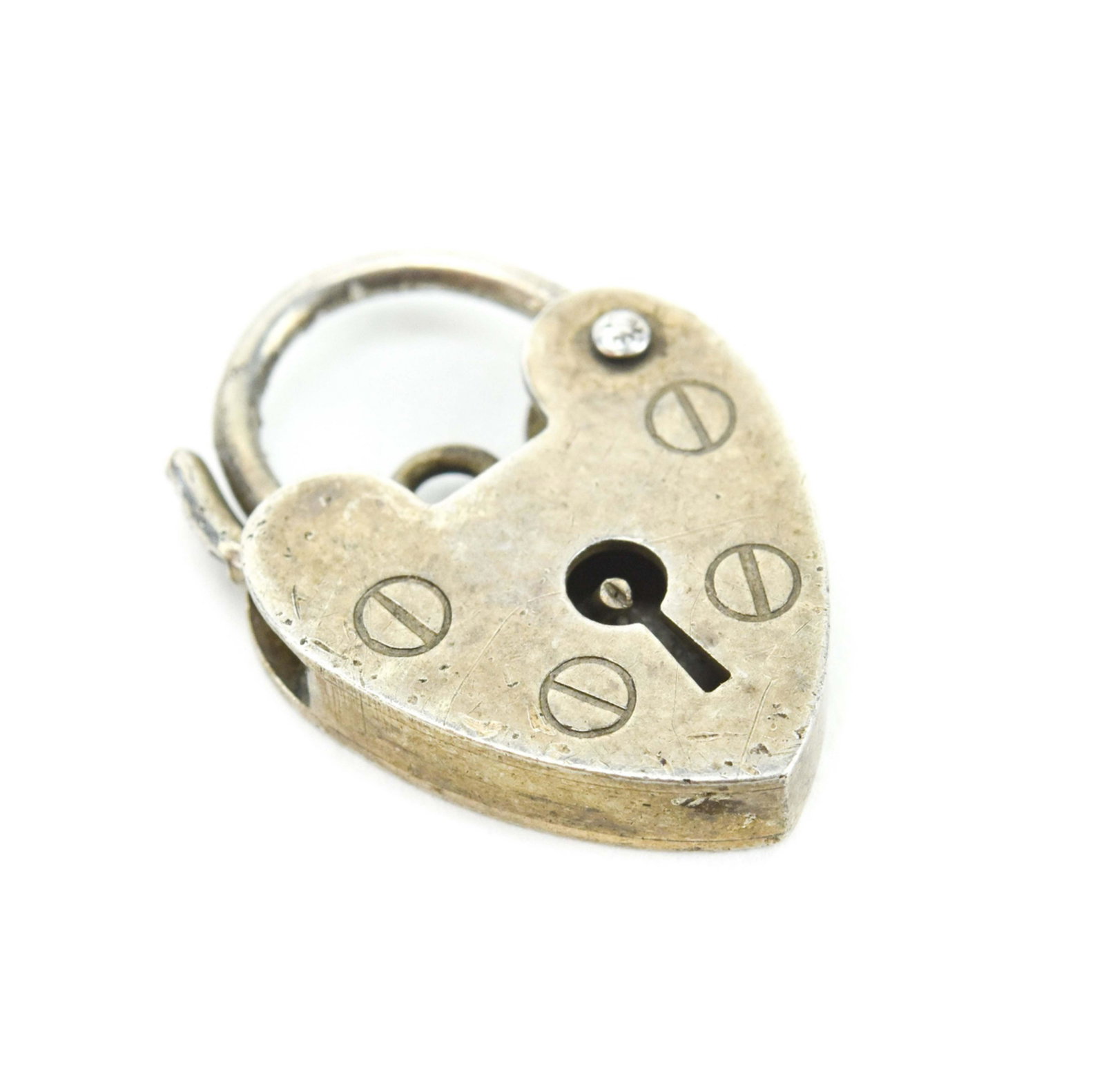 Antique Sterling Silver Heart Padlock Charm Clasp: Antique Sterling Silver Heart Padlock Charm or Clasp. English hallmarks on the back, made in London. Measures just over .75 of an inch in length.