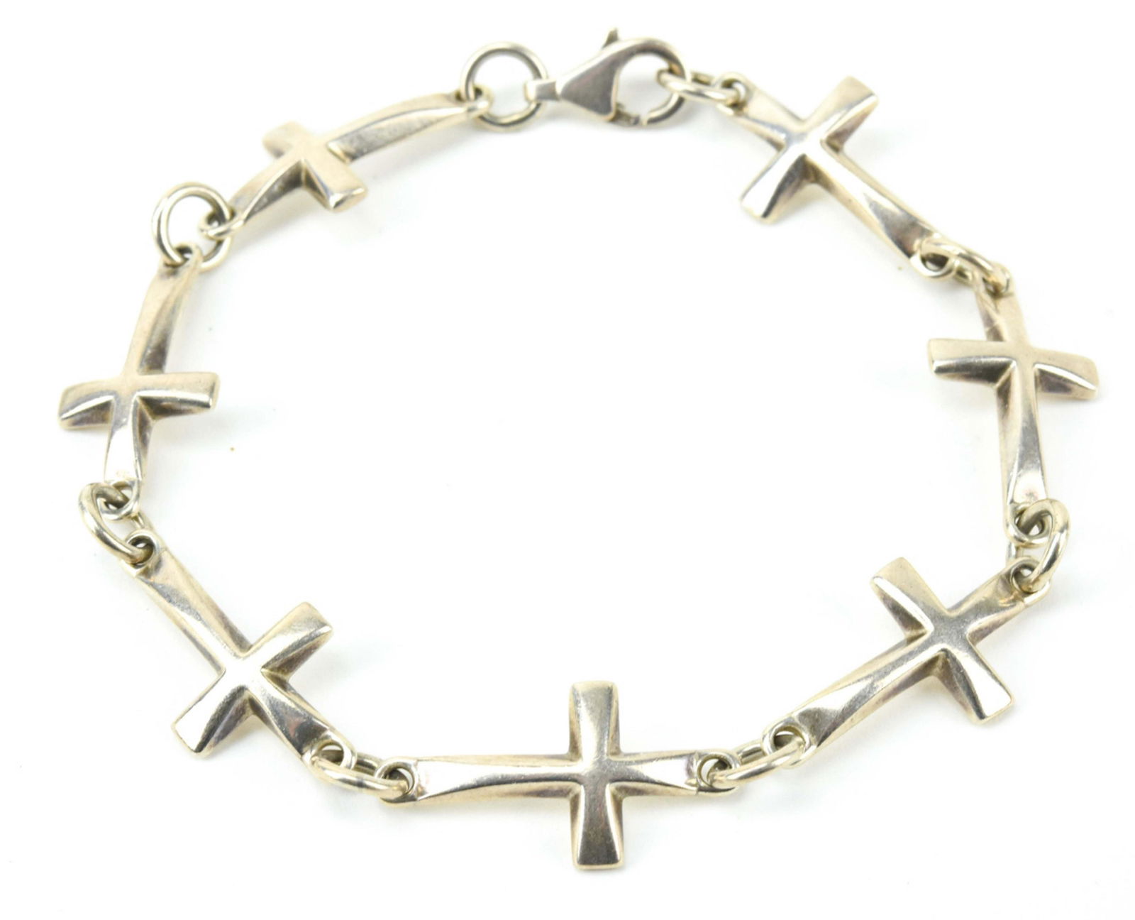 Robert Lee Morris Sterling Bracelet w Cross Design: Robert Lee Morris Sterling Silver Articulated Panel Bracelet w Cross Design. Signed RLM Studios 925. Measures 8.5 inches, easily shortened to smaller size.