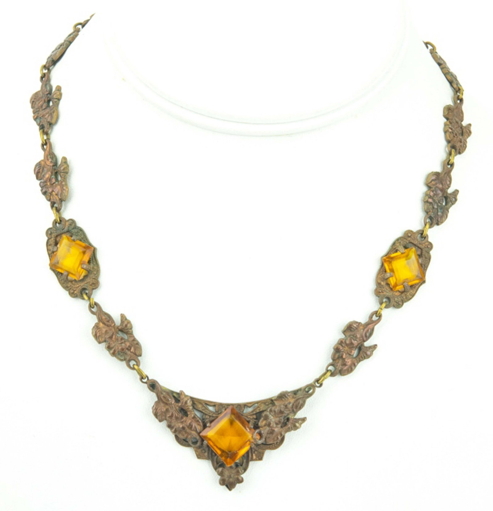 Antique Art Deco Czech Citrine Crystal Necklace: Antique Art Deco Czech Citrine Crystal Necklace. Gilt metal, citrine tone crystals, floral motif. Likely made in Czechoslovakia, but unmarked. Measures 16 inches in length.