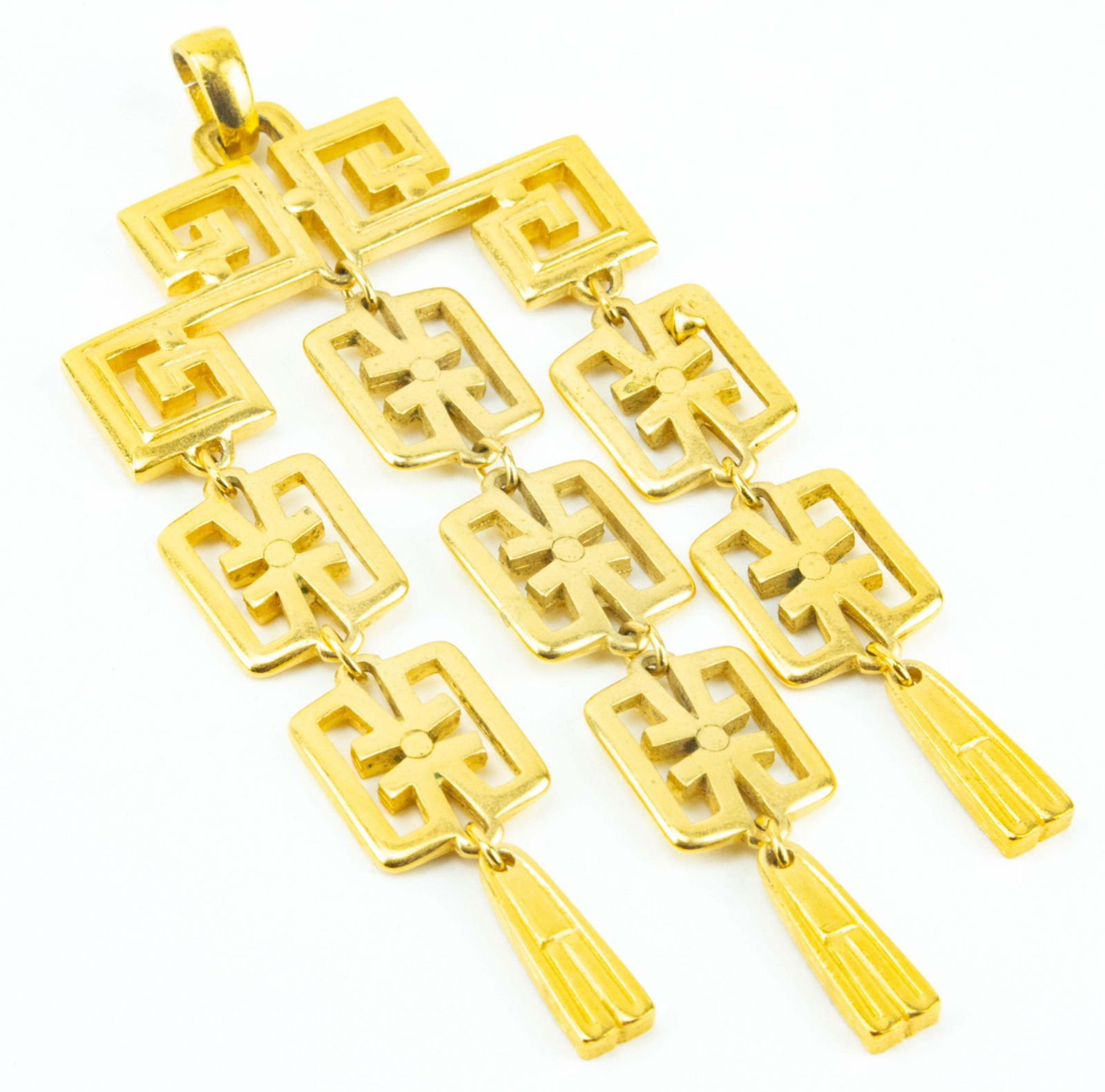 Vintage Crown Trifari Gilt Metal Costume Pendant: Vintage Crown Trifari Gilt Metal Costume Pendant. Articulated " waterfall " necklace pendant. Signed. Measures 4.75 inches in length.