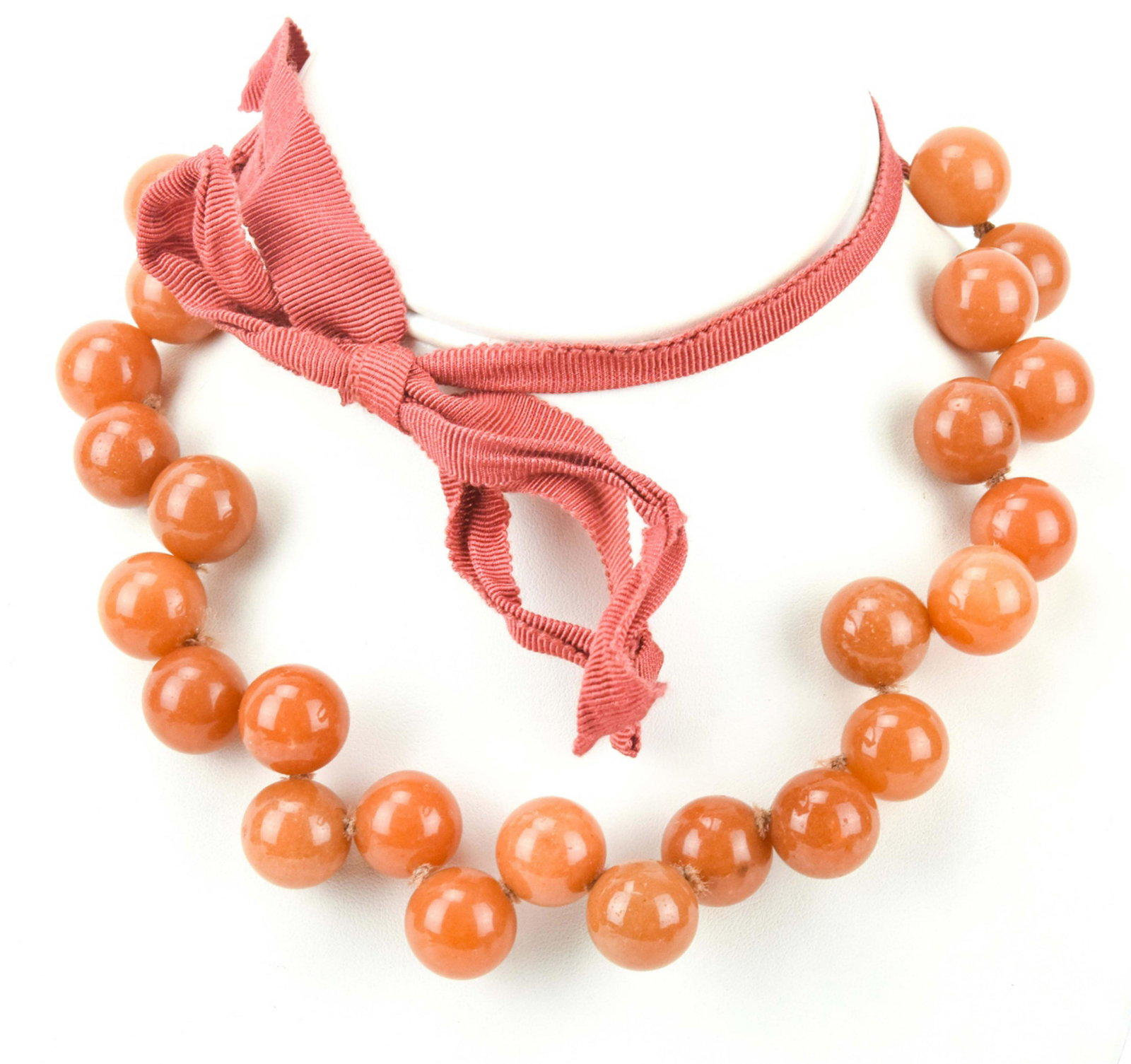 Hand Knotted Sunstone Feldspar Bead Necklace: Hand Knotted Sunstone Feldspar Bead Necklace w Ribbon. Adjustable in length slightly. Measures 28 inches in length as shown.