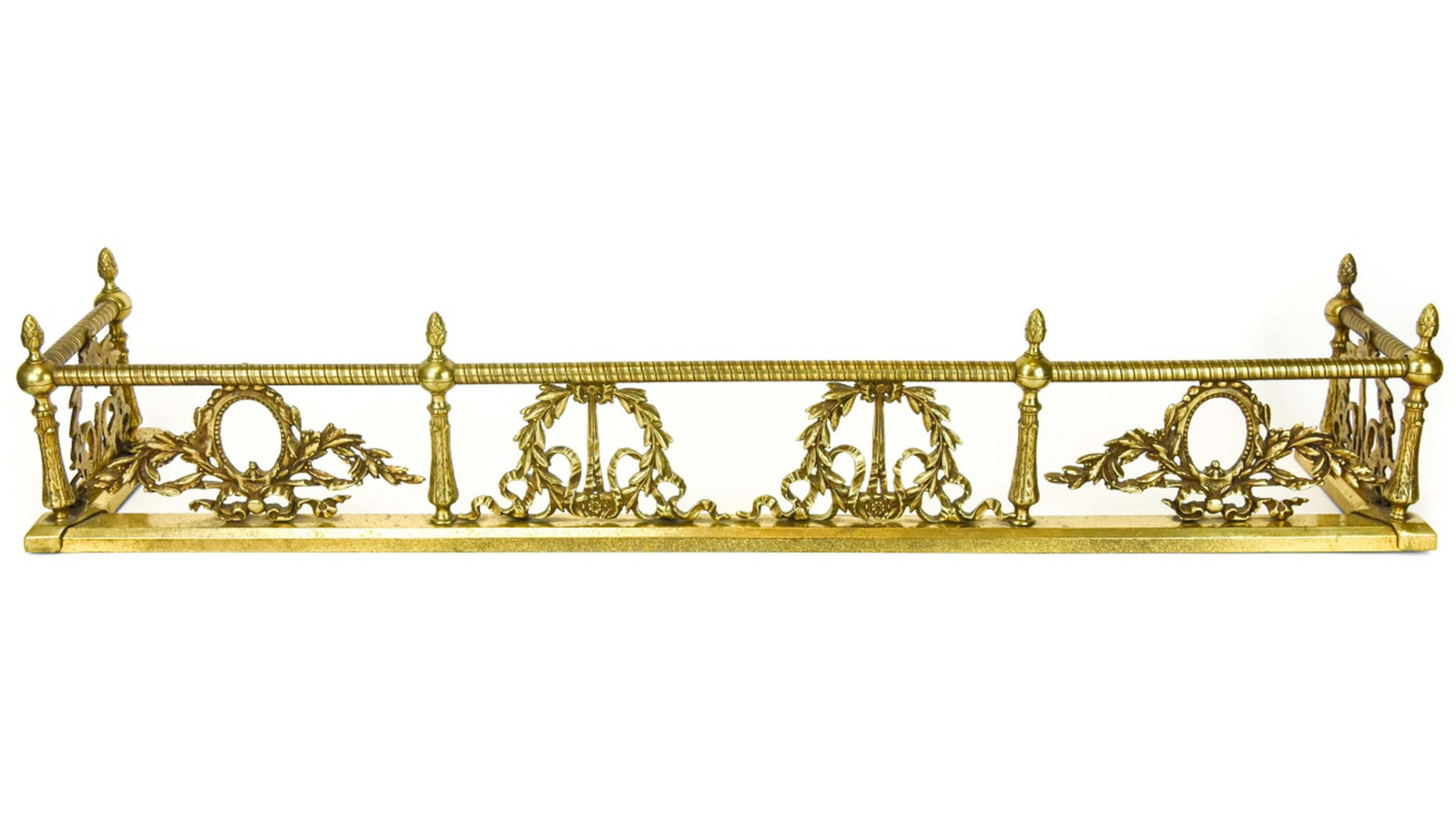 Neoclassical Style Brass Tone Fireplace Fender: Neoclassical Style Brass Tone Fireplace Fender. Measures 7.75 inches x 42 inches x 9.25 inches.