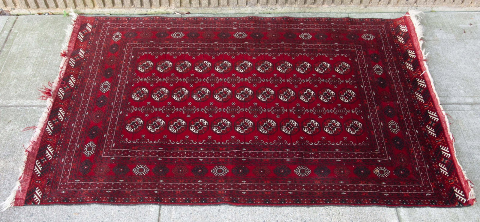 Persian Hand Knotted Bokhara Area Rug: Persian Hand Knotted Bokhara Area Rug. Measures 71 inches x 44 inches.