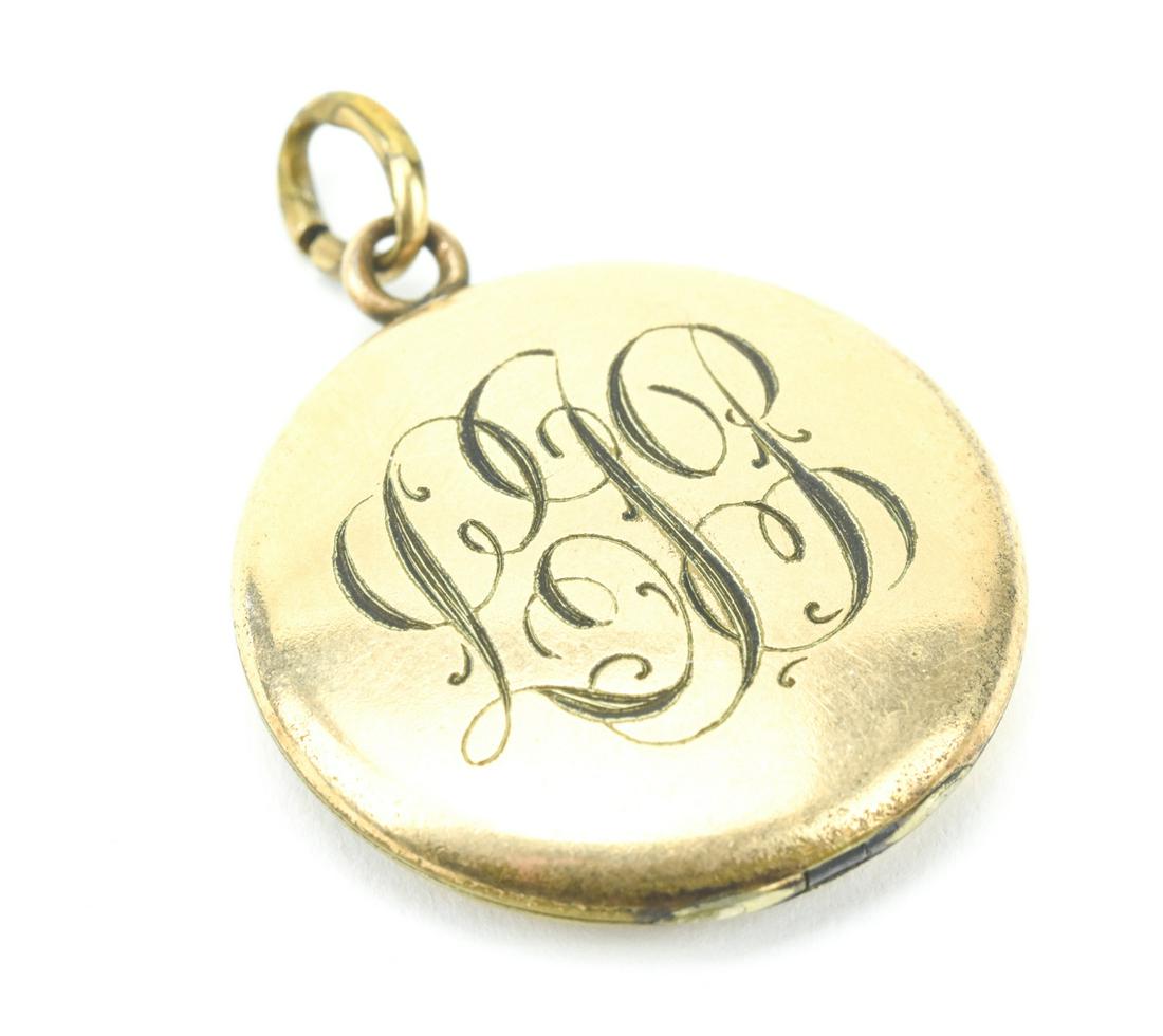 Antique C 1900 Art Nouveau Style Gold Fill Locket: Antique C 1900 Art Nouveau Style Gold Filled Locket Necklace Pendant. Monogram in an Art Nouveau design. Measures just over 1.5 inches in length with the bail.
