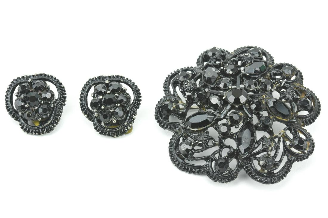 Vintage Costume Jewelry Czech Style French Jet Set: Vintage Costume Jewelry Czech Style French Jet Suite of Brooch & Pair of Clip on Earrings. The brooch measures just over 2 inches in diameter.