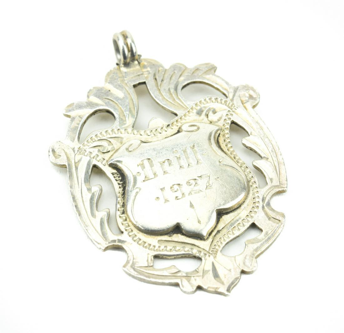 Antique English Sterling Silver Shield Pendant: Antique English Sterling Silver Shield Pendant. Signed and hallmarked on the back. Measures 1.5 inches in length.