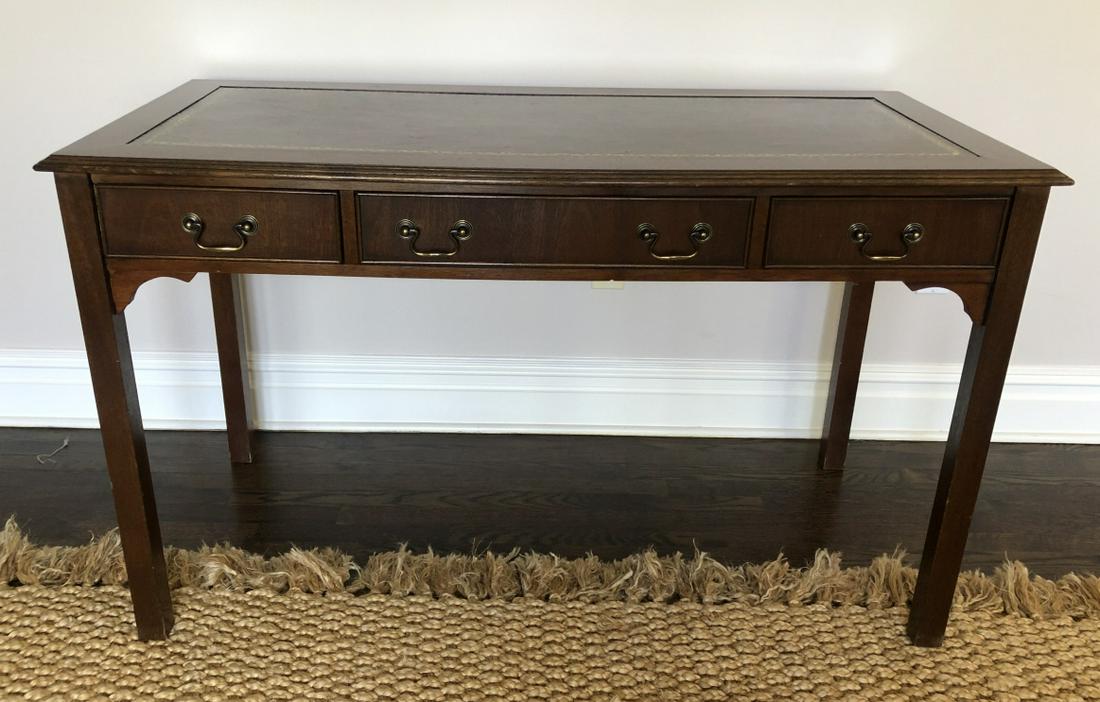 Chinese Chippendale Writing Desk w Inlaid Leather: Chinese Chippendale Writing Desk w Inlaid Embossed Leather Top and 3 Drawers. 31 inches x 53 inches x 25 inches, 25 inches from floor to center drawer.