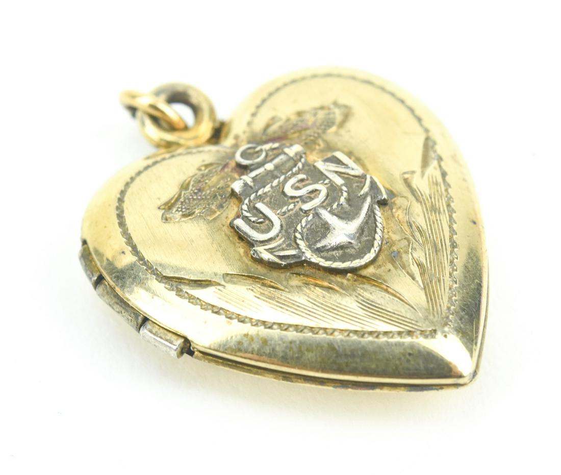 Antique WWII Era Navy Sweet Heart Locket Pendant: Antique WWII Era Navy Sweet Heart Locket Pendant. Gold filled. USA and naval anchor on the front. Measures 1 inch in length.