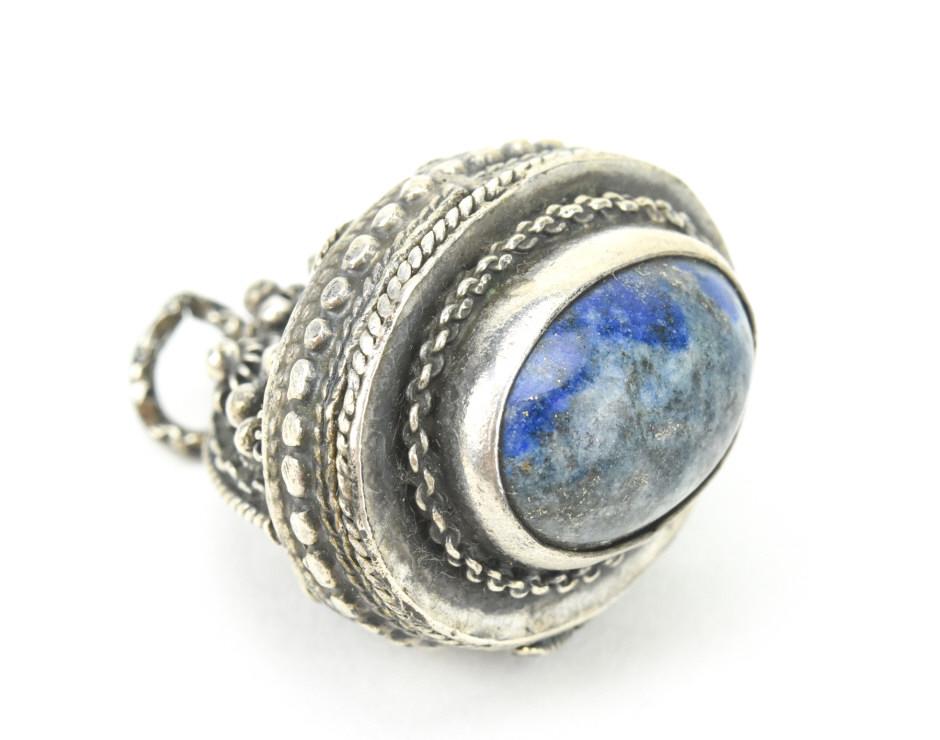 Antique Etruscan Revival 800 Silver Locket Pendant: Antique Etruscan Revival 800 Silver Locket Pendant w Sodalite Cabochon. Interior hallmarked. Measures just over 1.25 inches in length.