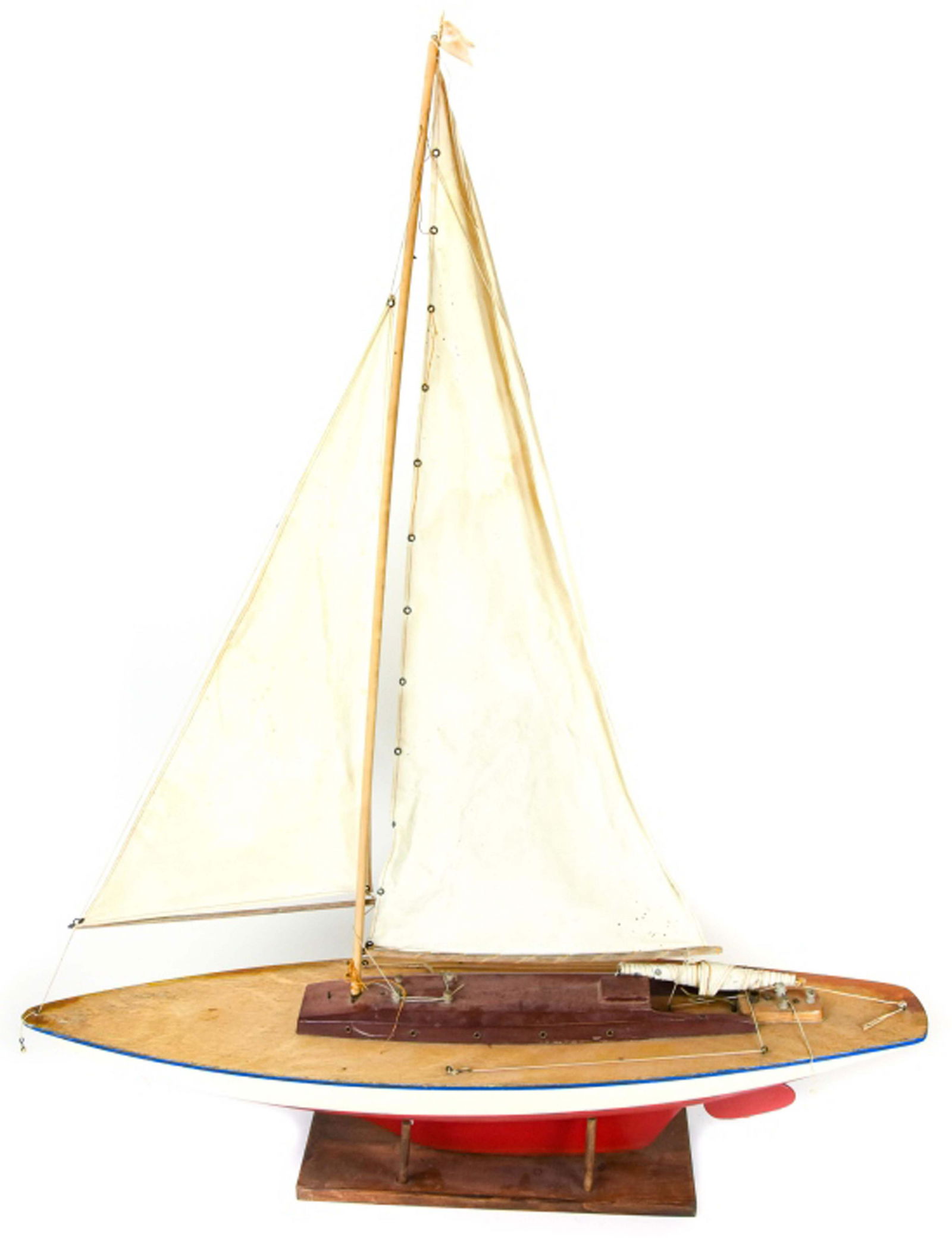 Hand Carved Vintage Pond Racer w Sails & Stand: Hand Carved Vintage Pond Racer w Sails & Stand. Boat measures 36 inches x 44 inches x 8 inches.