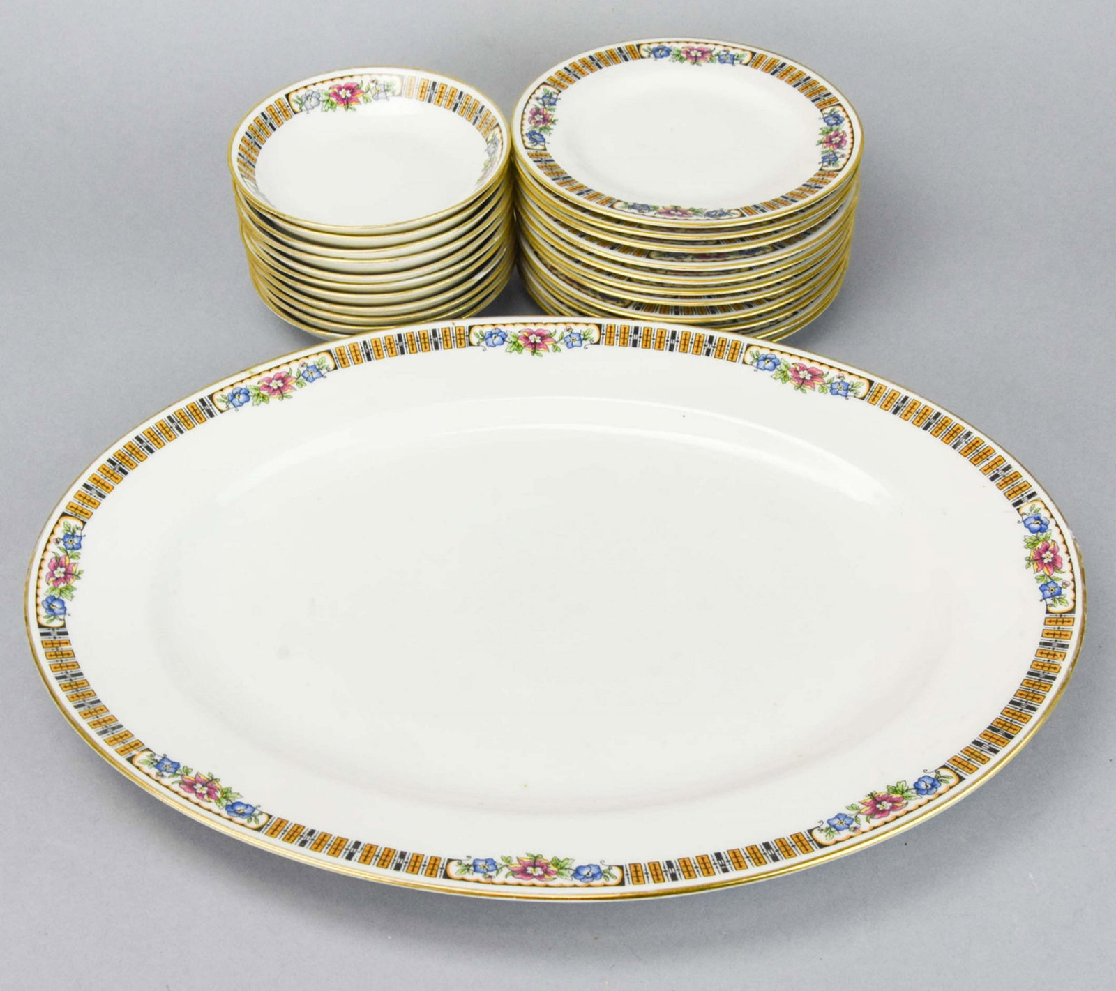 Ahrendfeldt Limoges Partial Set: Ahrendfeldt Limoges Partial Set. Includes serving platter, 11 salad plates, 11 fruit bowl. Serving platter measures 17 inches.