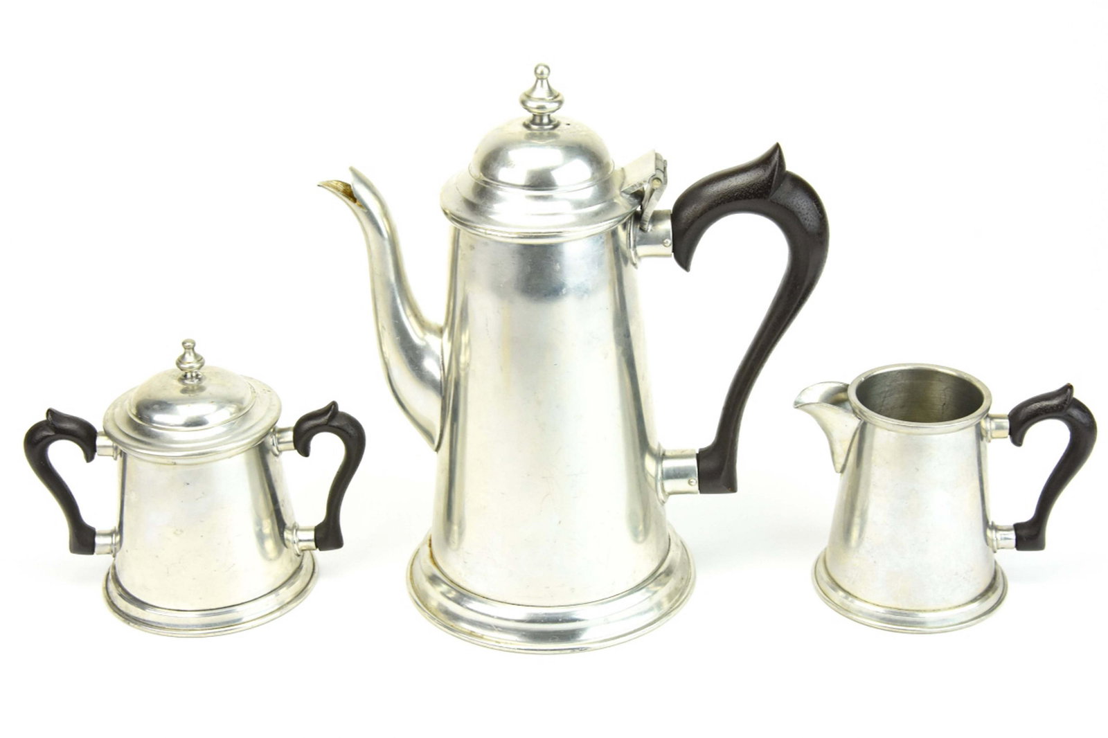 Vintage Steiff Pewter Coffee Pot, Creamer, Sugar: Vintage Steiff Pewter Coffee Pot, Creamer, Sugar with Carved Handles. Coffee Pot measures 10 inches x 8 inches.