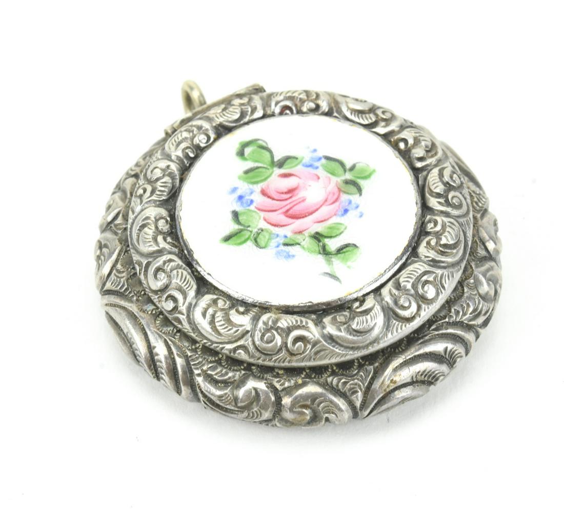Antique Repousse Sterling Guilloche Enamel Locket: Antique Repousse Sterling Guilloche Enamel Locket Necklace Pendant. Measures 2 inches in length.