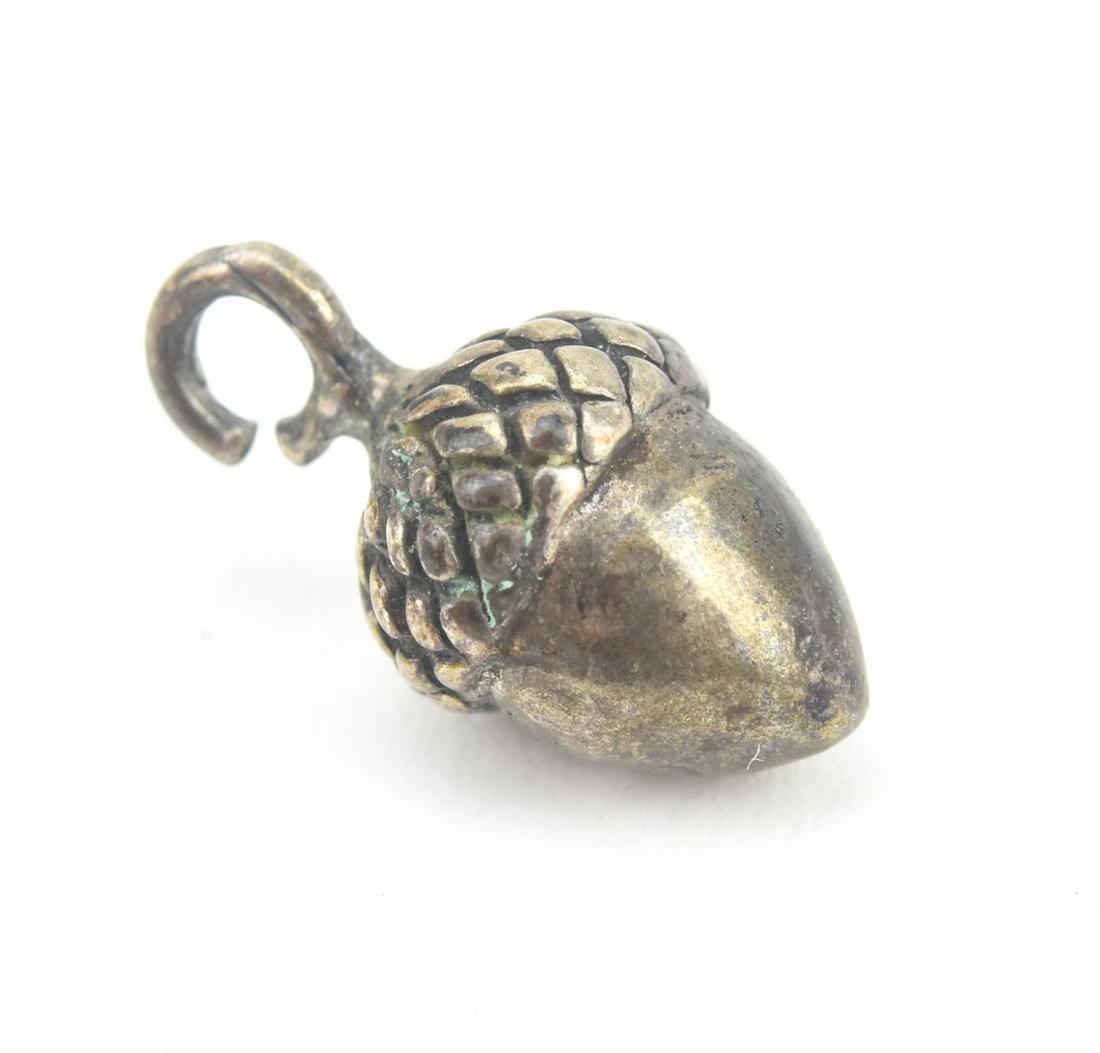 Antique Sterling Silver Acorn Pendant or Charm: Antique Sterling Silver Acorn Pendant or Charm. Measures just over 1/2 an inch in length.