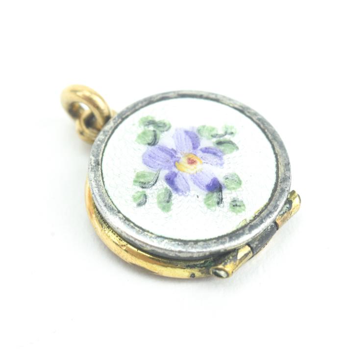 Antique Sterling & Guilloche Enamel Locket Pendant: Antique Miniature Sterling & Guilloche Enamel Locket Necklace Pendant. Hand painted floral motif enamel scene. Measures just over 1/2 inches in length with the bail.