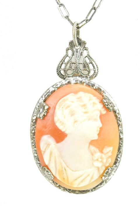 Antique Art Deco Sterling Cameo Necklace Pendant: Antique Art Deco Sterling Cameo Necklace Pendant on Chain. The back of the pendant is hallmarked. Chain measures approximately 17 inches in length.