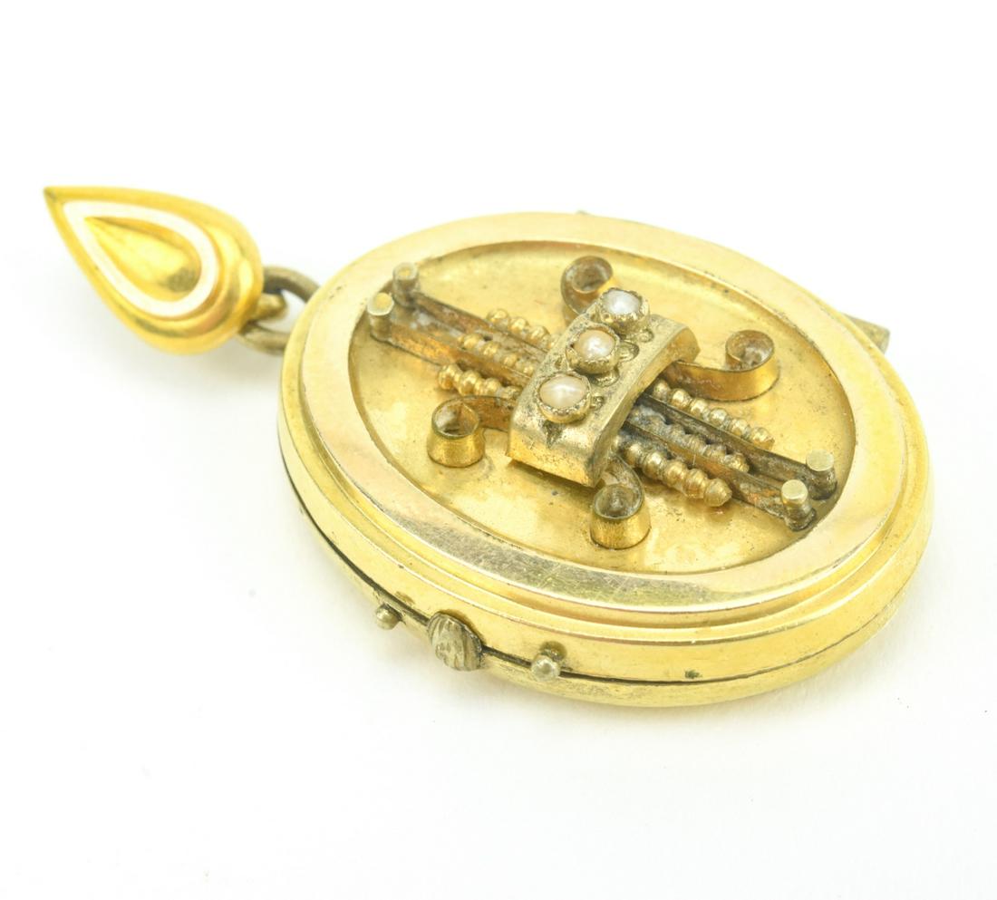 Antique 19th C Gold Filled & Gold Topped Locket: Antique 19th C Gold Filled & Gold Topped Locket w Seed Pearls. Gold filled locket with geometric design and seed pearls having a gold top oval halo. Measures nearly 2 inches in length.