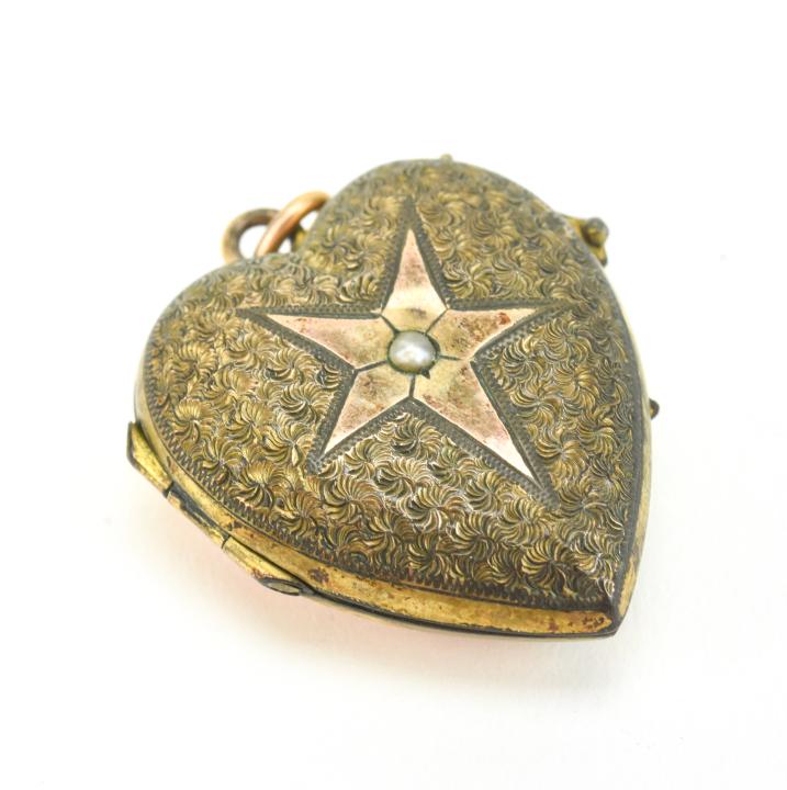 Antique 19th C Heart Locket w Seed Pearl Starburst: Antique 19th C Heart form Locket Necklace Pendant w Seed Pearl Starburst. Measures just over 1.25 inches in length.