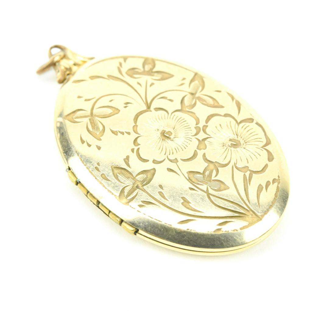 Estate Gold Filled Floral Motif Locket Pendant: Estate Gold Filled Floral Motif Locket Necklace Pendant. Measures 1.75 inches in length.