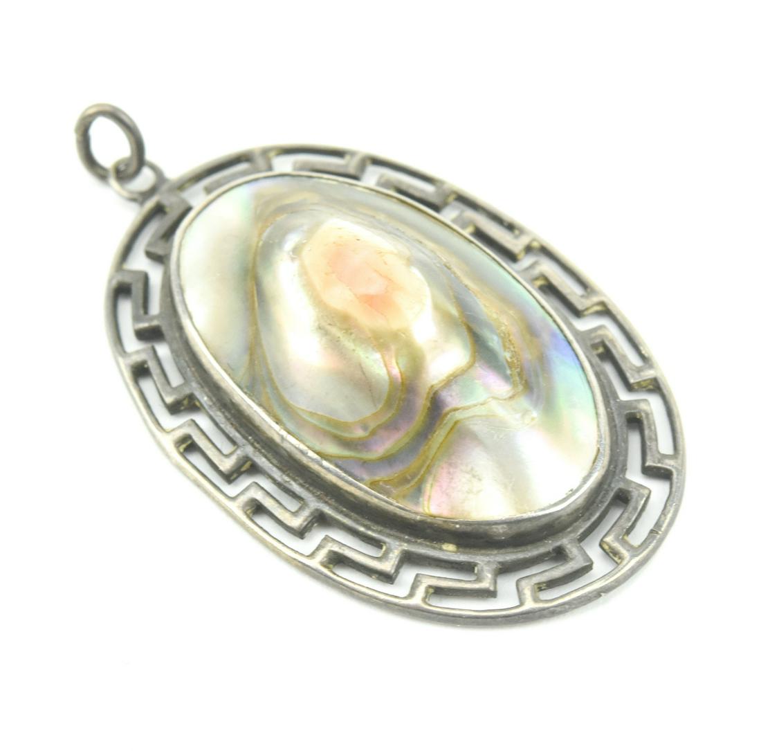 Antique Sterling Greek Key & Abalone Pendant: Antique Sterling Silver Greek Key & Abalone Necklace Pendant. Hallmarked. Measures just over 1.5 inches in length.