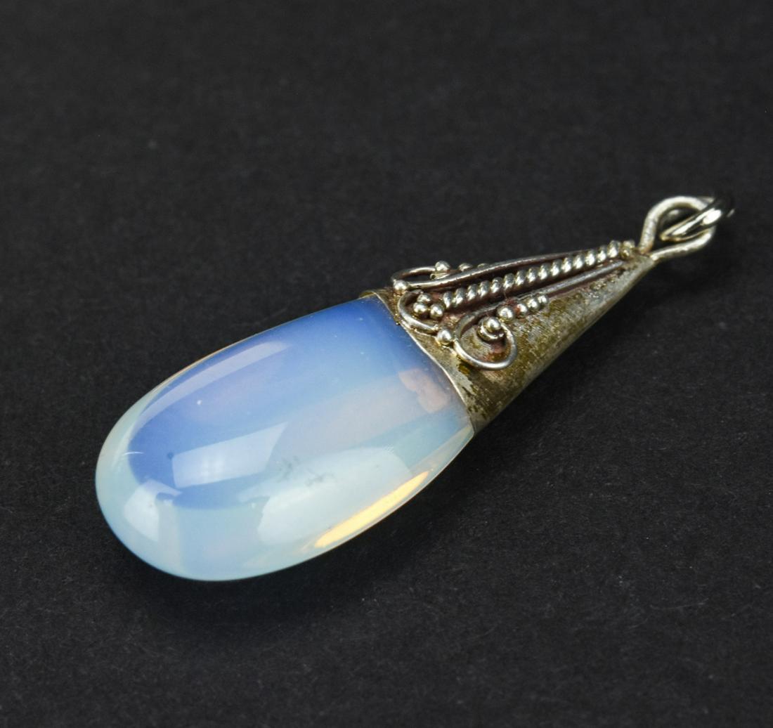 Sterling Silver & Moonstone Necklace Pendant: Sterling Silver & Moonstone Necklace Pendant. Measures 1.5 inches in length.