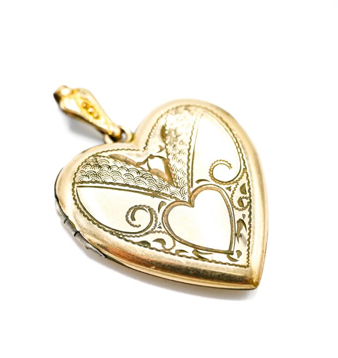 Antique Heart Form Gold Filled Locket Pendant: Antique Heart Form Gold Filled Locket Pendant. Measures 1.5 inches in length.