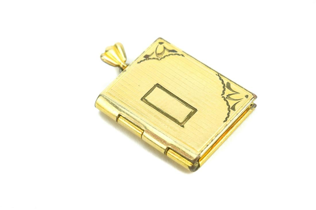 Vintage Gold Filled Book Form Locket Pendant: Vintage Gold Filled Book Form Locket Necklace Pendant. Measures 1 inch in length.