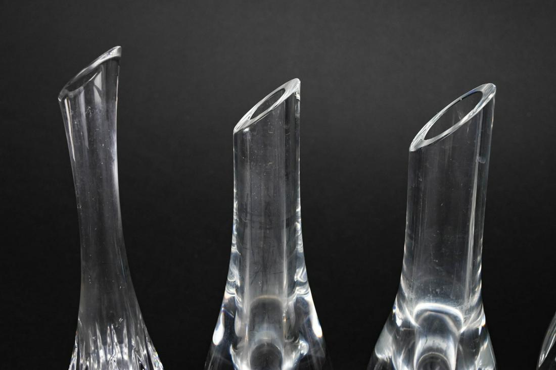 4 Baccarat Crystal Flower Vases: 4 Baccarat Crystal Flower Vases. Tallest measures 9.5 inches x 3 inches diameter.