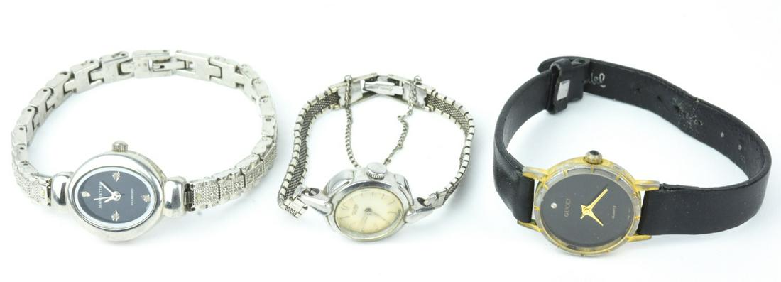 Three Vintage Ladies Wrist Watches: Three Vintage Ladies Wrist Watches. Made by Gucci and Manhattan. Accent diamonds