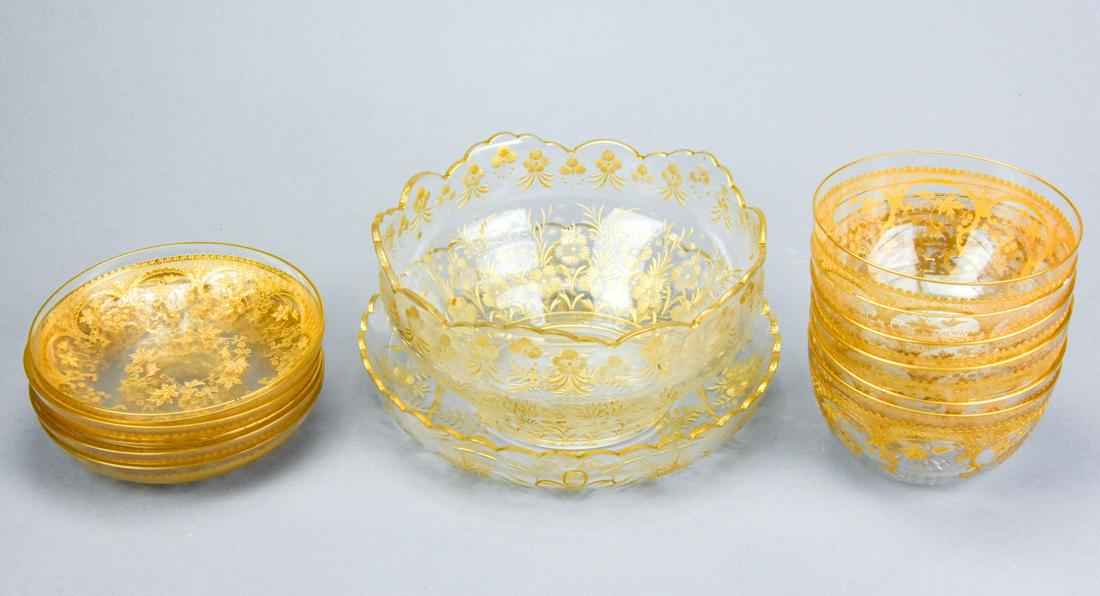 Set Antique Bavarian Glass Bowls & Saucers: Set Antique Bavarian Glass Bowls & Saucers. 6 bowls and saucer and 1 centerpiece bowl and underplate. Some pieces with chips. Centerpiece bowl measures 4 inches x 7.5 inches in diameter.