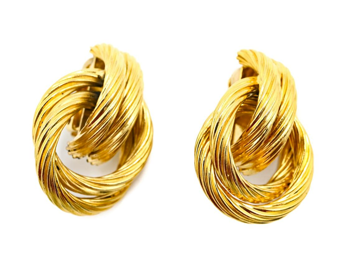 Pair Givenchy French Gilt Clip on Costume Earrings: Pair Givenchy French Gilt Clip on Costume Earrings. Signed. Each measures 1.5 inches in length.