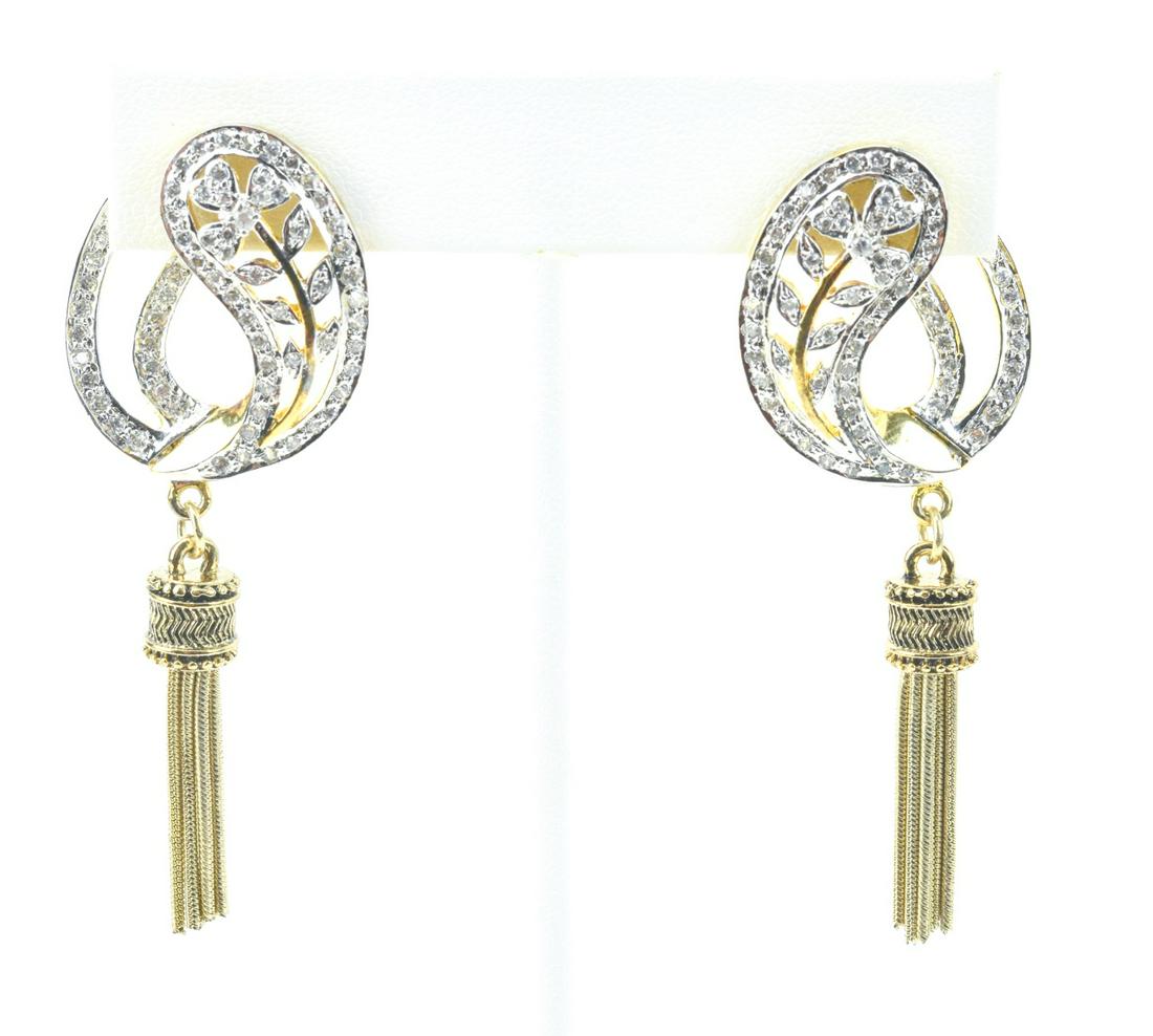 Pair of Gold Plated & Pave Set Tassel Earrings: Pair of Gold Plated & Pave Set Tassel Earrings. Top portion with bypass design are gold plated, pave set with rhinestones, gilt tassels suspended. Each measures 2.5 inches in length.