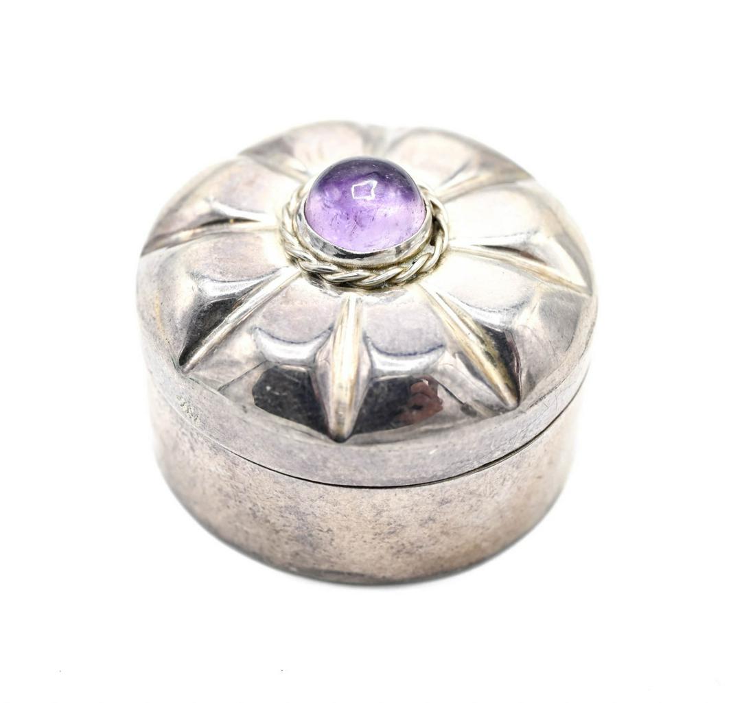 Sterling Silver & Cabochon Amethyst Jewelry Box: Sterling Silver & Cabochon Amethyst Jewelry Box / Pill Box. Made in Mexico, likely TAXCO. Measures 1.25 inches in diameter.