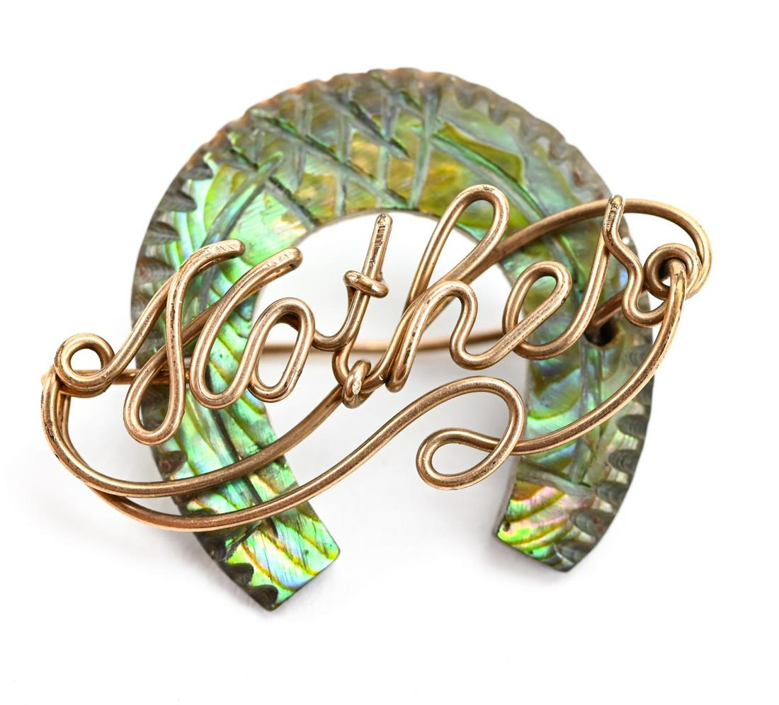 Antique 19th C Abalone Horse Shoe Mother Brooch: Antique 19th C Abalone Horse Shoe Mother Brooch w Gold Filled Setting. Measures 1 inch in length.