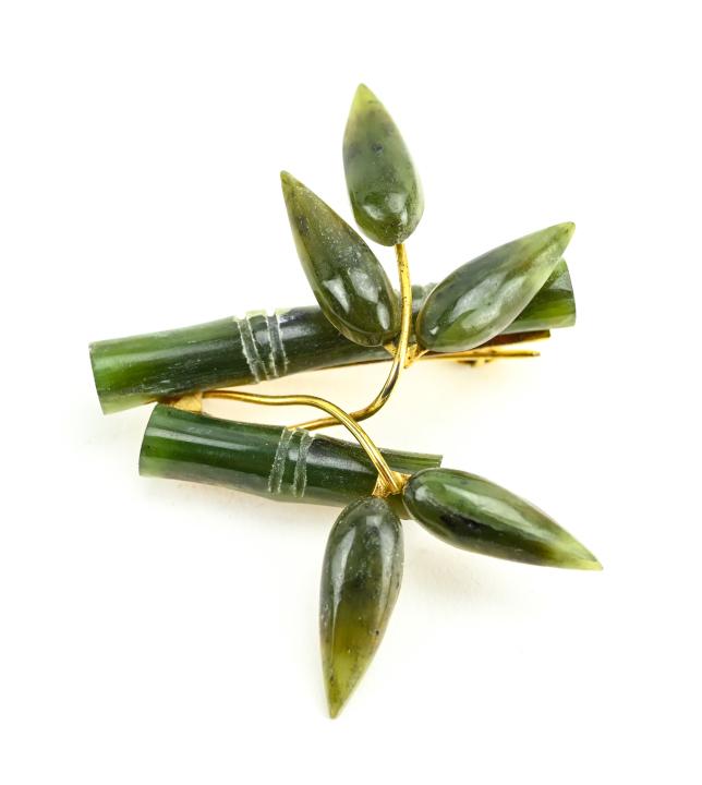 Vintage Chinese Carved Jade Bamboo Form Brooch: Vintage Chinese Carved Jade Bamboo Form Brooch. Measures 1.75 inches in length.