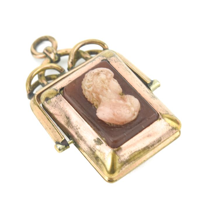 Antique 19th C Banded Agate & Cameo Spinner Locket: Antique 19th C Banded Agate & Cameo Spinner Locket Necklace Pendant. Gold filled frame, one side with carved sardonyx cameo, one side with banded black and white agate. Measures 1.5 inches in length.