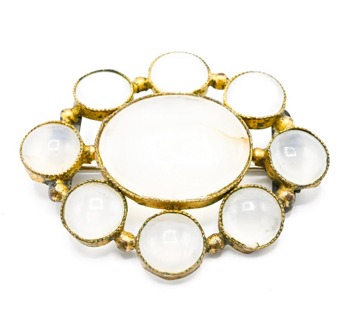 Antique C 1820 Georgian Chalcedony Brooch: Antique C 1820 Georgian Cabochon Chalcedony Brooch in Pinchbeck or Gilt Metal. Measures nearly 2 inches in width.