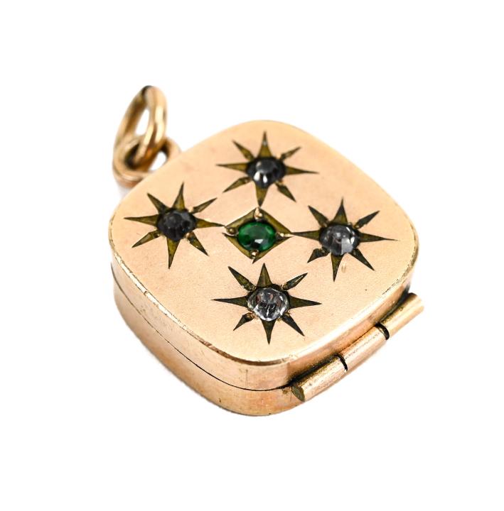 Antique 19th C Gold Filled Locket Necklace Pendant: Antique 19th C Gold Filled Locket Necklace Pendant. Design of starburst setting paste stones on front. Measures 1 inch in length.