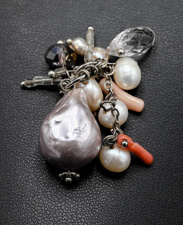 Sterling Silver Baroque Pearl & Coral Bead Pendant: Sterling Silver Baroque Pearl & Coral Bead Pendant. Measures 1.5 inches in length.