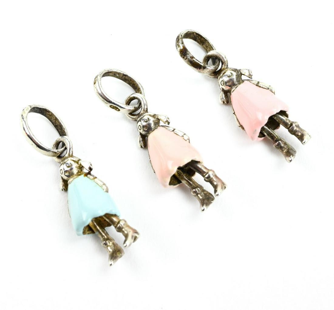 Three Sterling Silver & Enamel Children Charms: Three Sterling Silver & Enamel Children Charms. Each just over 1 inch in length and articulated.