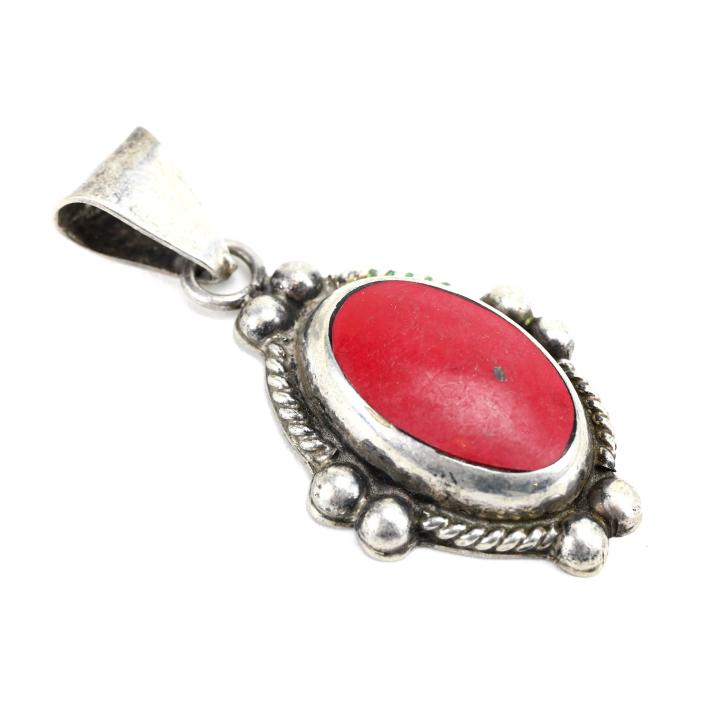 Native American Style Sterling Coral Pendant: Native American Style Sterling Coral Necklace Pendant. Taxco, made in Mexico. Measures 2 inches in length. From a single owner lifetime collection of Native American jewelry.
