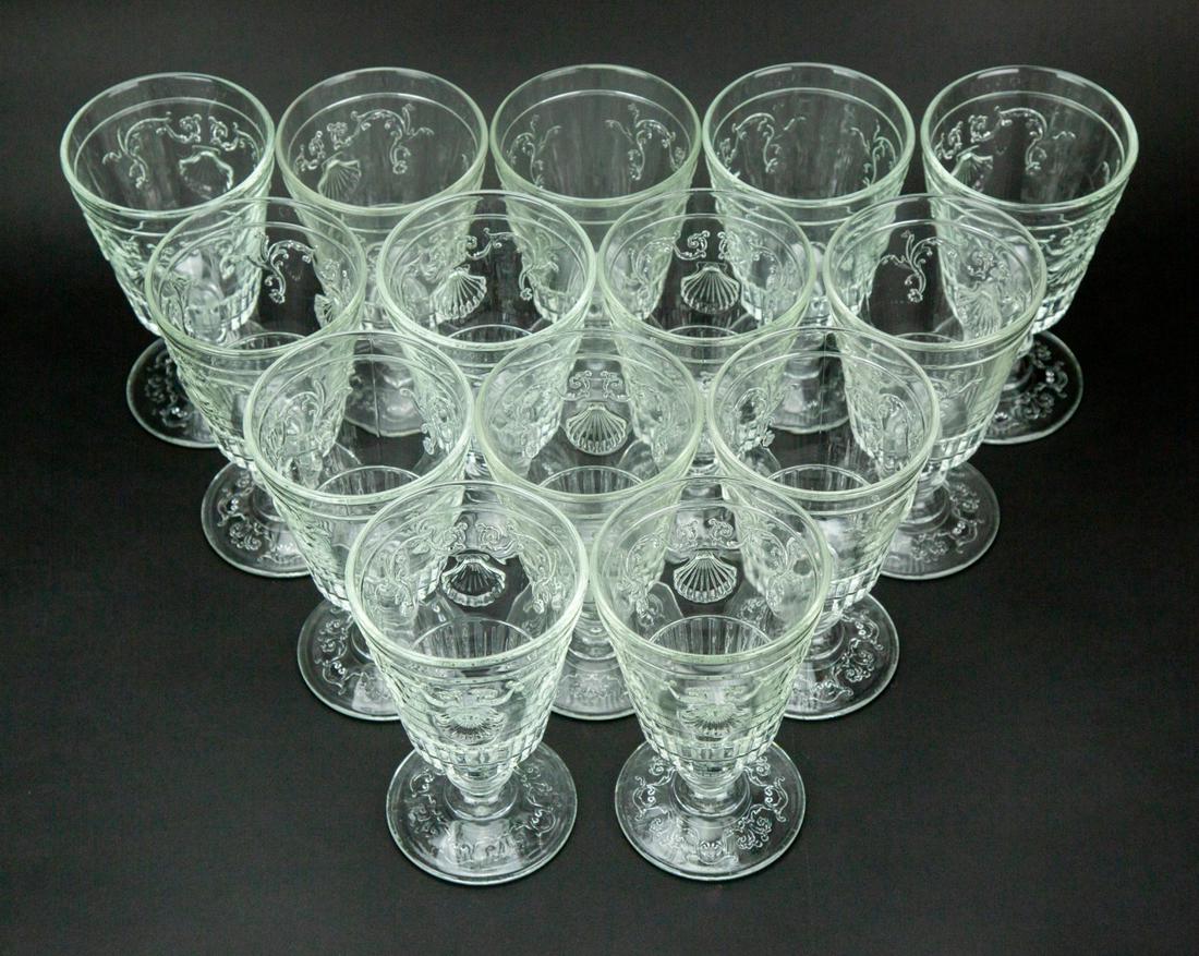 14 Rocher France Pressed Glass Wine Goblets: 14 Rocher France Pressed Glass Sea Shell Motif Wine Goblets.Measures 7 inches x 4 inches diameter