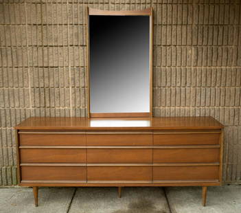 Paul McCobb Style Bassett Lowboy Dresser w Mirror: Paul McCobb Style Bassett Mid Century Walnut 9 Drawer Lowboy Dresser with Mirror. Measures 31 inches x 72 inches x 18 inches.